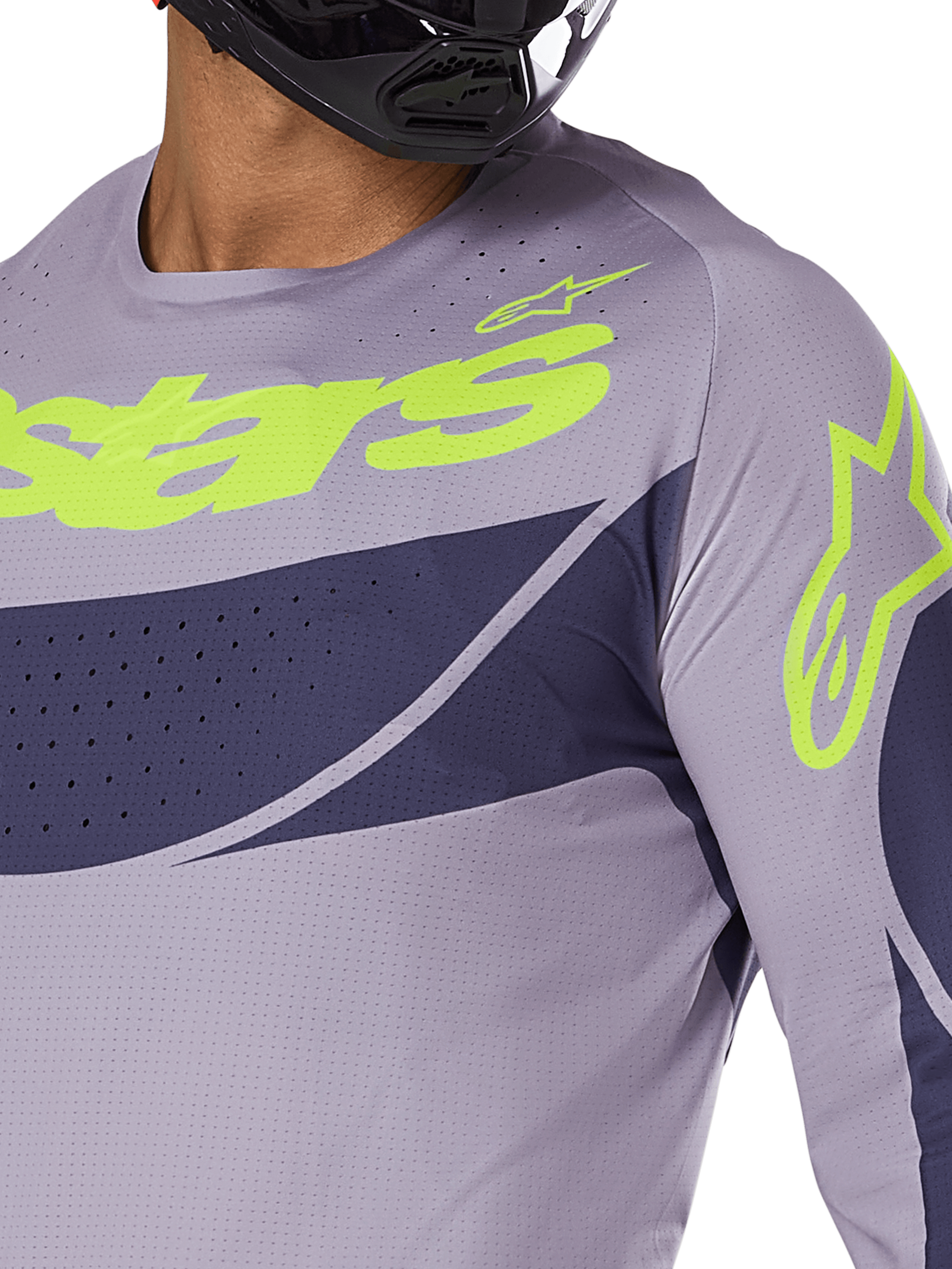 Alpinestars 2025 Techstar Dreem Jersey, motorcross jersey, grijs en marineblauw met fel limoengroen logo, close-up van rijder met zwarte helm, voorzien van laser-gesneden perforaties voor ventilatie