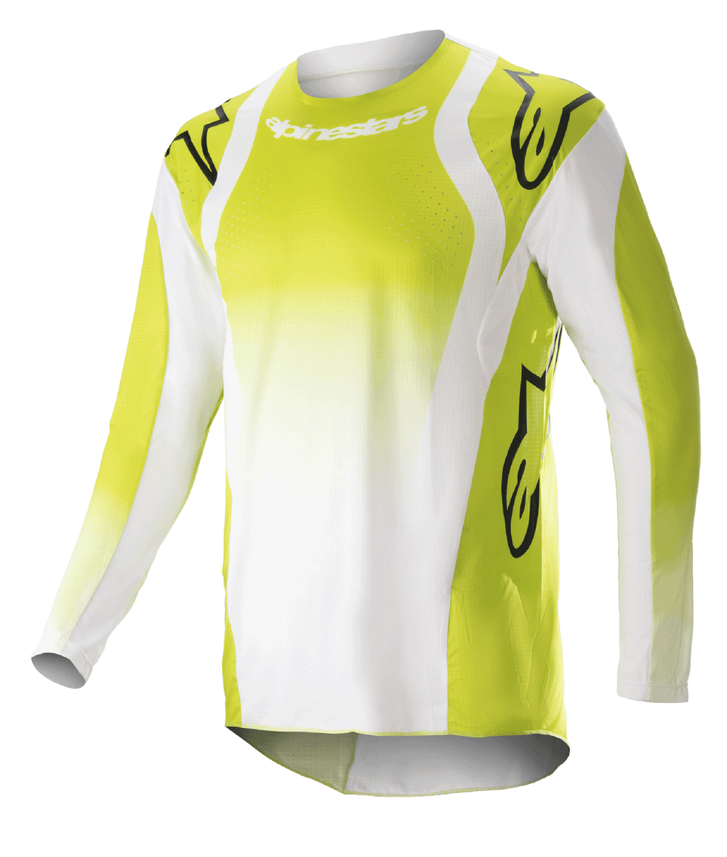Alpinestars 2023 Techstar Push Jersey, motorcross shirt met lange mouwen, fel geel en wit, voorzien van grote zwarte Astars-logo's op schouders en mouwen, geperforeerde stof, ronde hals en verlengde achterkant voor off-road racen