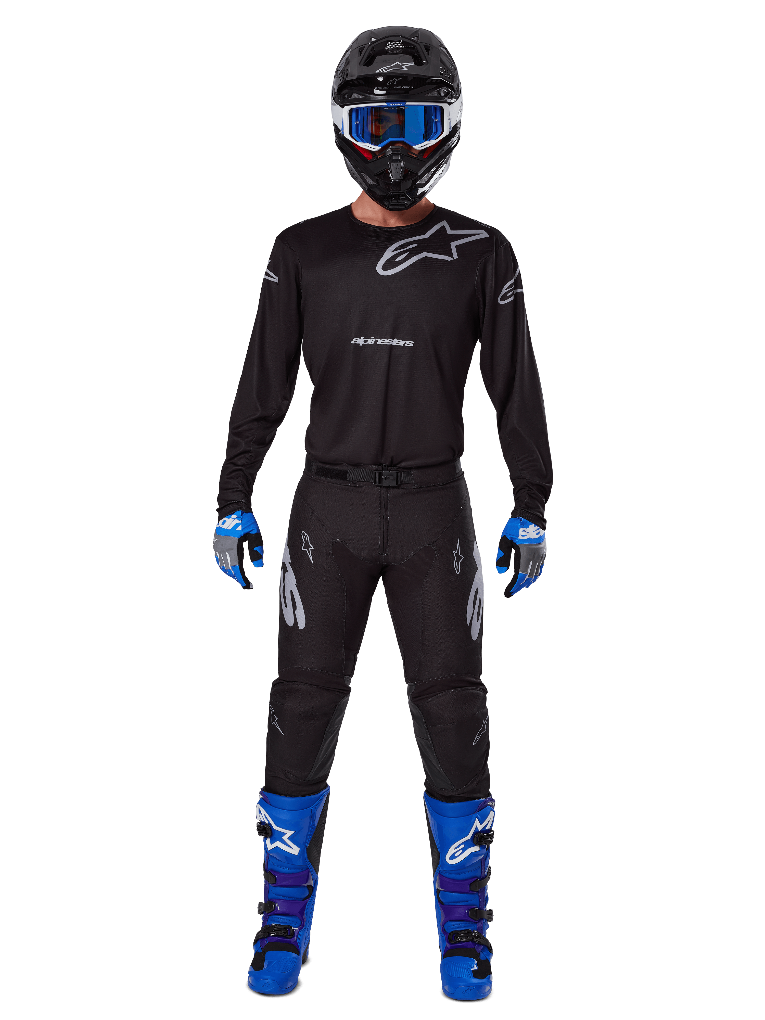 Alpinestars 2025 Racer Graphite Gear Set, Motocross rider wearing complete racing gear, black long-sleeve jersey with gray Alpinestars logos, black pants, black helmet with blue goggles, blue and gray gloves, blue and black boots, coordinated outfit for off-road motocross racing