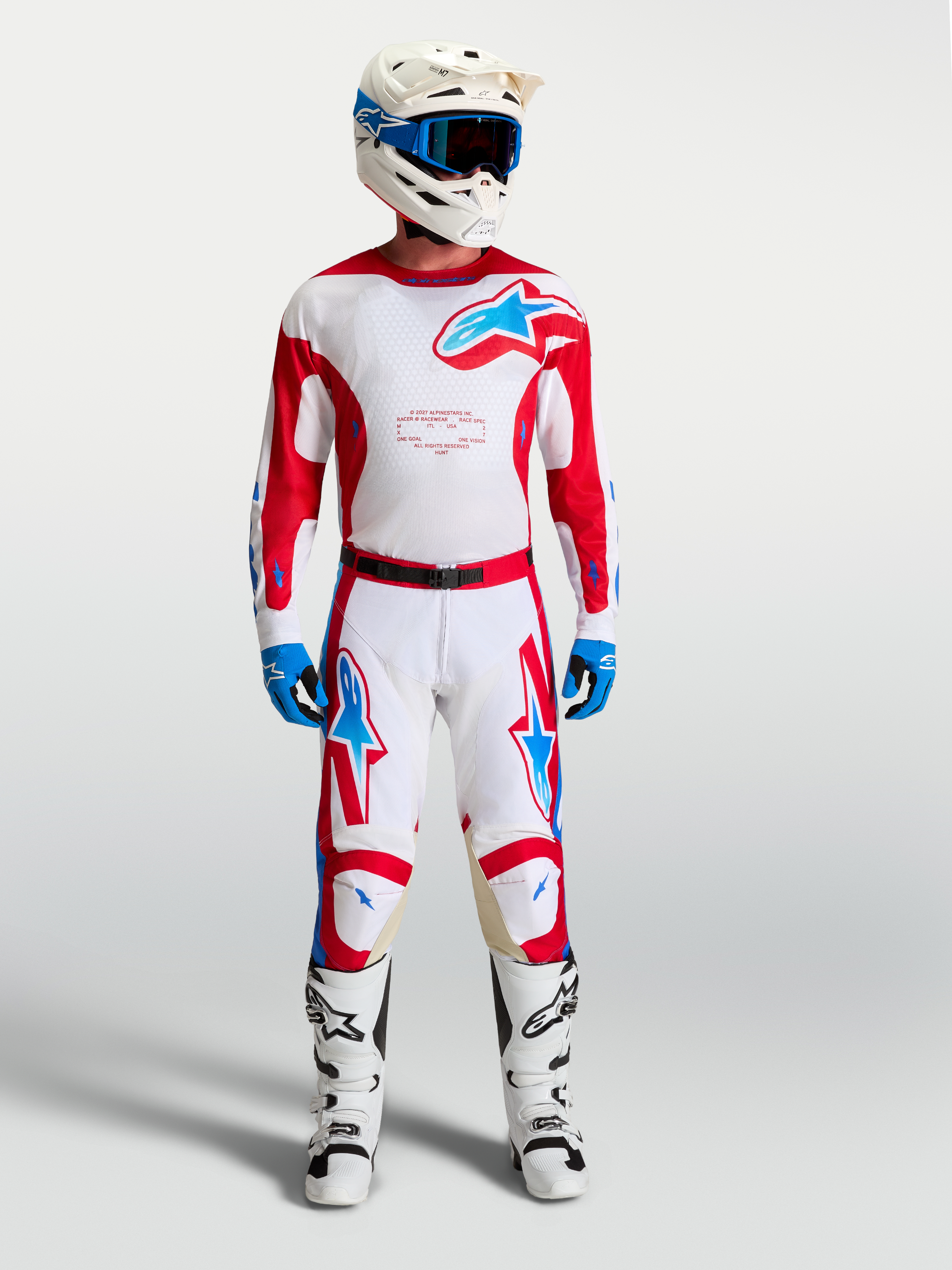 Alpinestars Racer Hunt Jersey, white and red men's motocross gear set with blue accents, matching pants and boots.