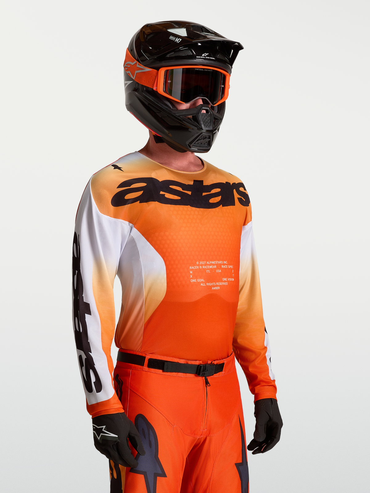 Alpinestars Racer Amber jersey, heren-motocrossjersey, oranje en wit, lichtgewicht polyfabric met ergonomische race-pasvorm.