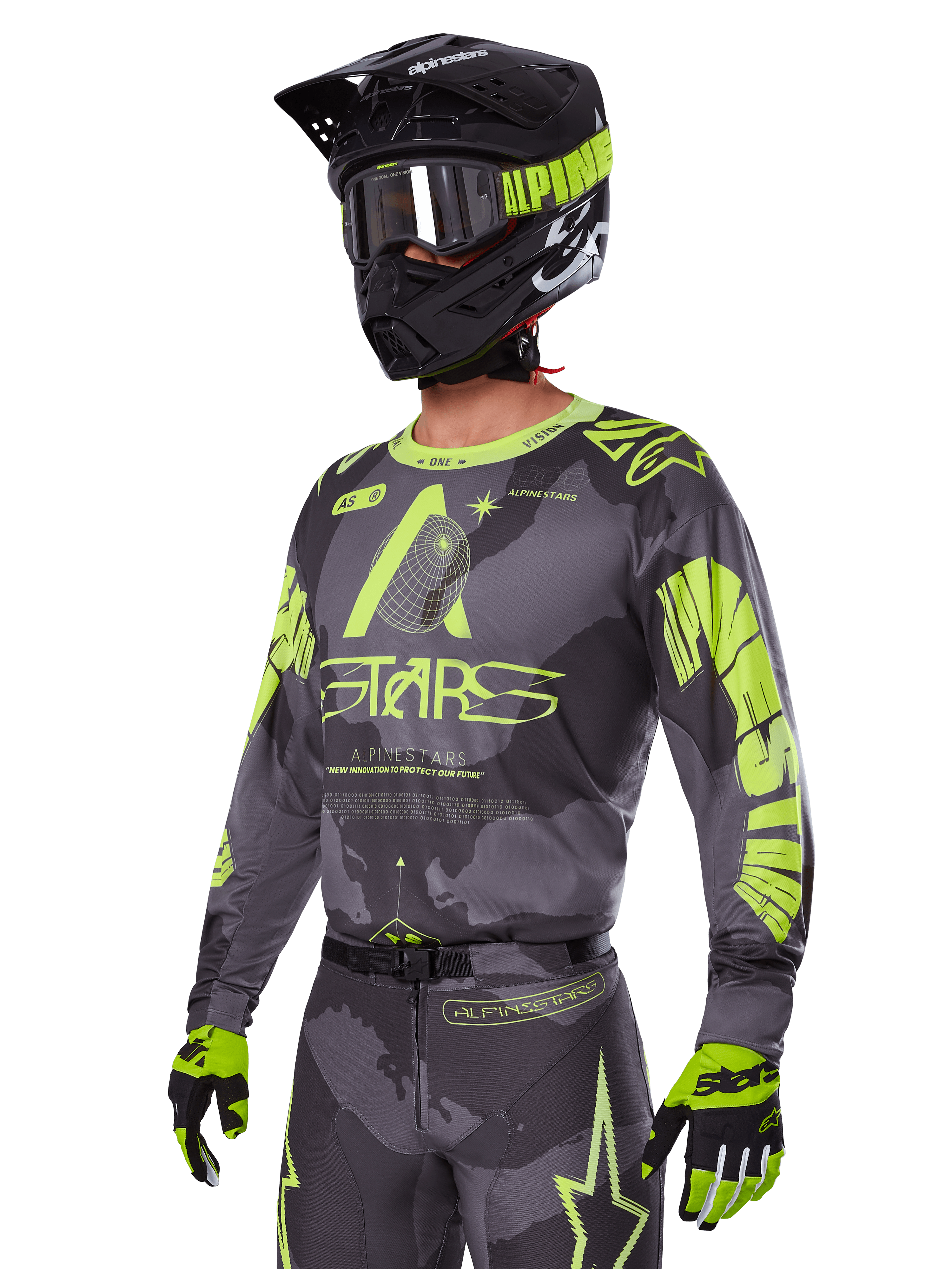 Alpinestars 2025 Racer Hollow Gear Set, Motocross jersey and pants in Gray and Neon Yellow, worn with matching black helmet, goggles, and gloves, featuring bold fluorescent yellow Alpinestars branding and star graphics on a patterned gray base, coordinated professional off-road racing look
