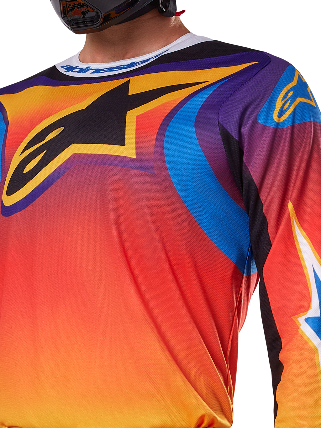 Alpinestars 2025 Fluid Wurx Jersey, multicolor wit en oranje ontwerp, motorcross shirt met lange mouwen, ontspannen atletische pasvorm, vochtafvoerend polyfabric voor off-road prestaties