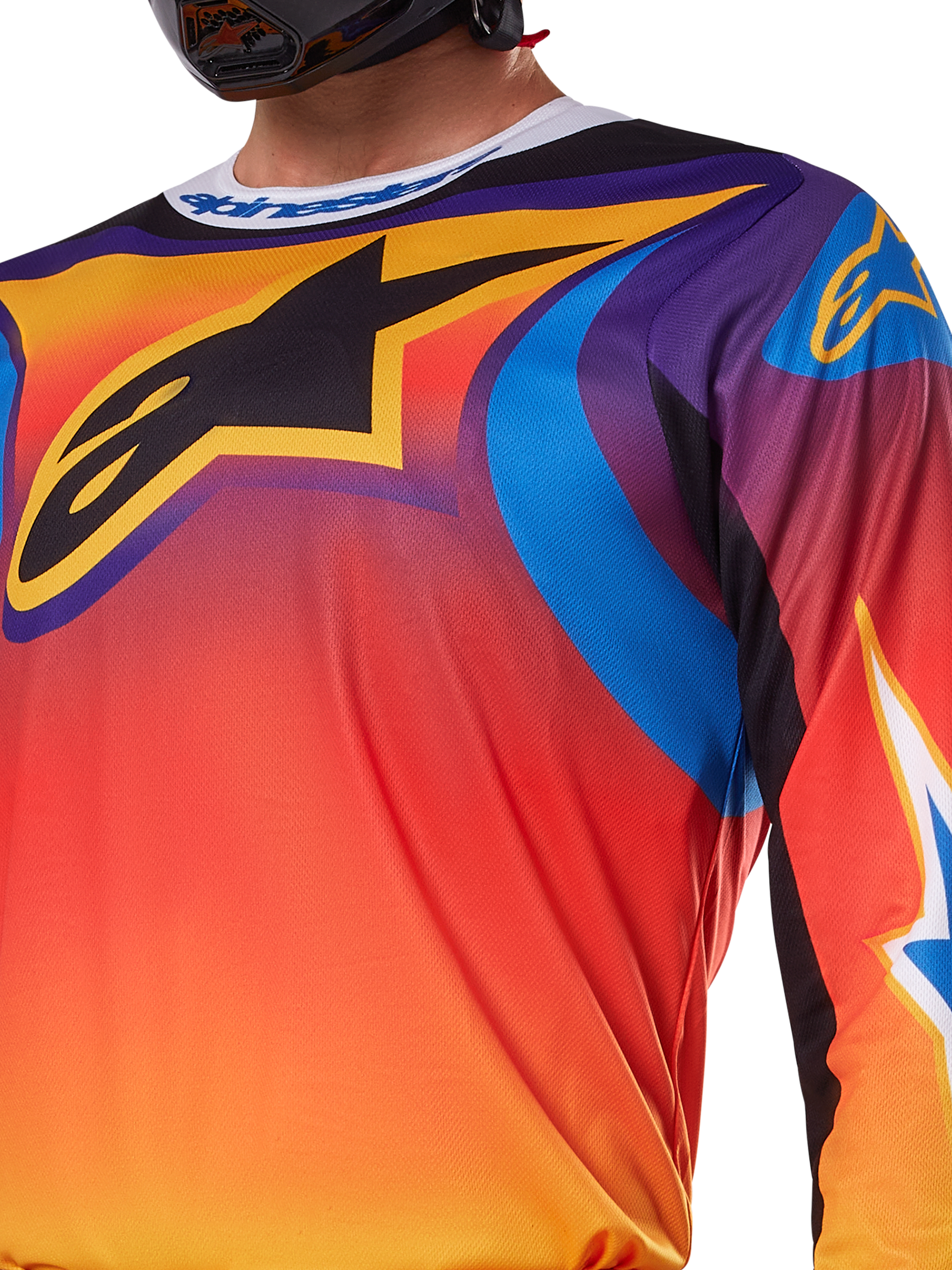 Alpinestars 2025 Fluid Wurx Jersey, multicolor wit en oranje ontwerp, motorcross shirt met lange mouwen, ontspannen atletische pasvorm, vochtafvoerend polyfabric voor off-road prestaties