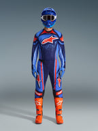Alpinestars 2026 Techstar Nomur Gear Set, Motocross Racing Gear, Dark Navy, Orange and UCLA Blue, complete riding outfit with blue helmet, matching jersey and pants, blue gloves, and bright orange boots, featuring star logos, performance off-road protection