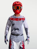 Alpinestars Racer Air Lone jersey, ademend heren-motocrossjersey in grijs camouflage en rood, lichtgewicht mesh-materiaal.