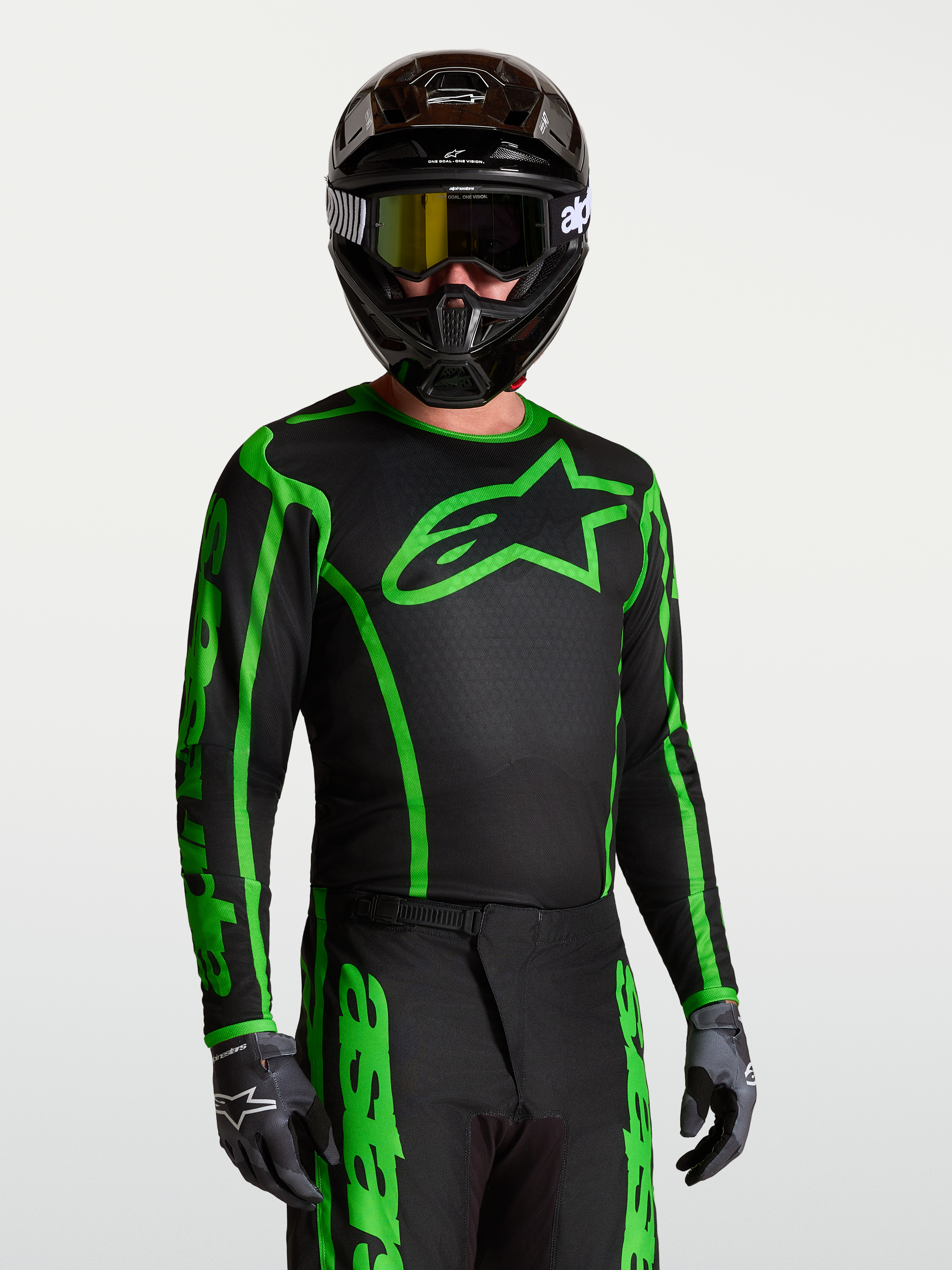 Alpinestars Fluid Apex V2 jersey, herenmotorcrossjersey in zwart en fluogroen van lichtgewicht vochtafvoerend textiel voor MX.