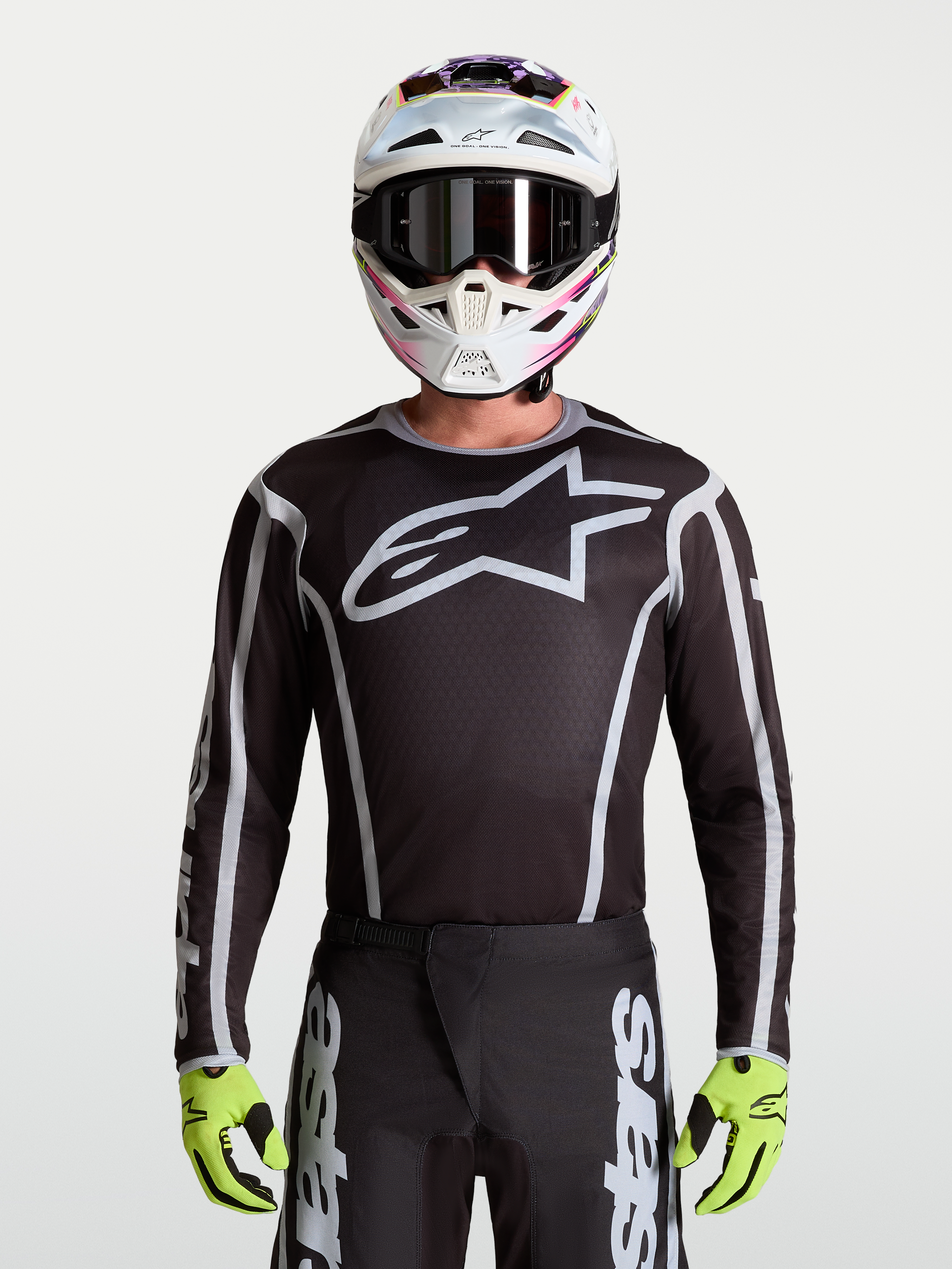 Alpinestars Fluid Apex V2 jersey, herenmotorcrossjersey, zwart en zilver, groot sterlogo, atletische pasvorm.
