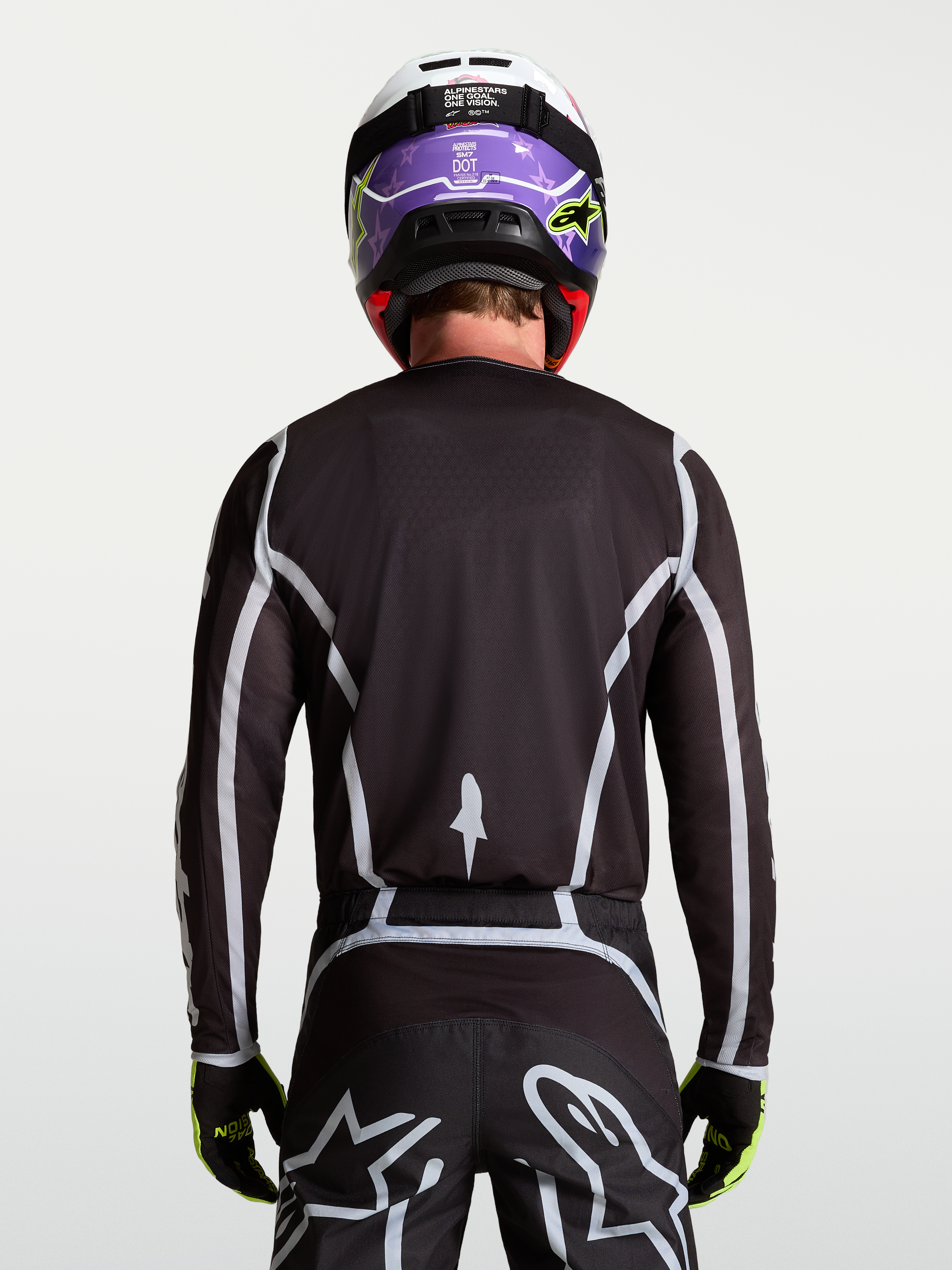 Alpinestars Fluid Apex V2 heren-jersey, zwart en zilver, achteraanzicht met ergonomische atletische pasvorm.