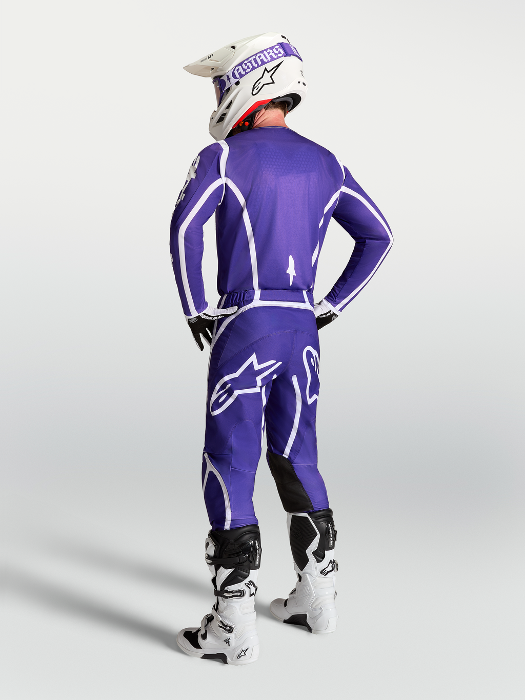 Alpinestars Fluid Apex V2 jersey, heren-motorcrosskleding in blauw en wit, achteraanzicht met atletische pasvorm.
