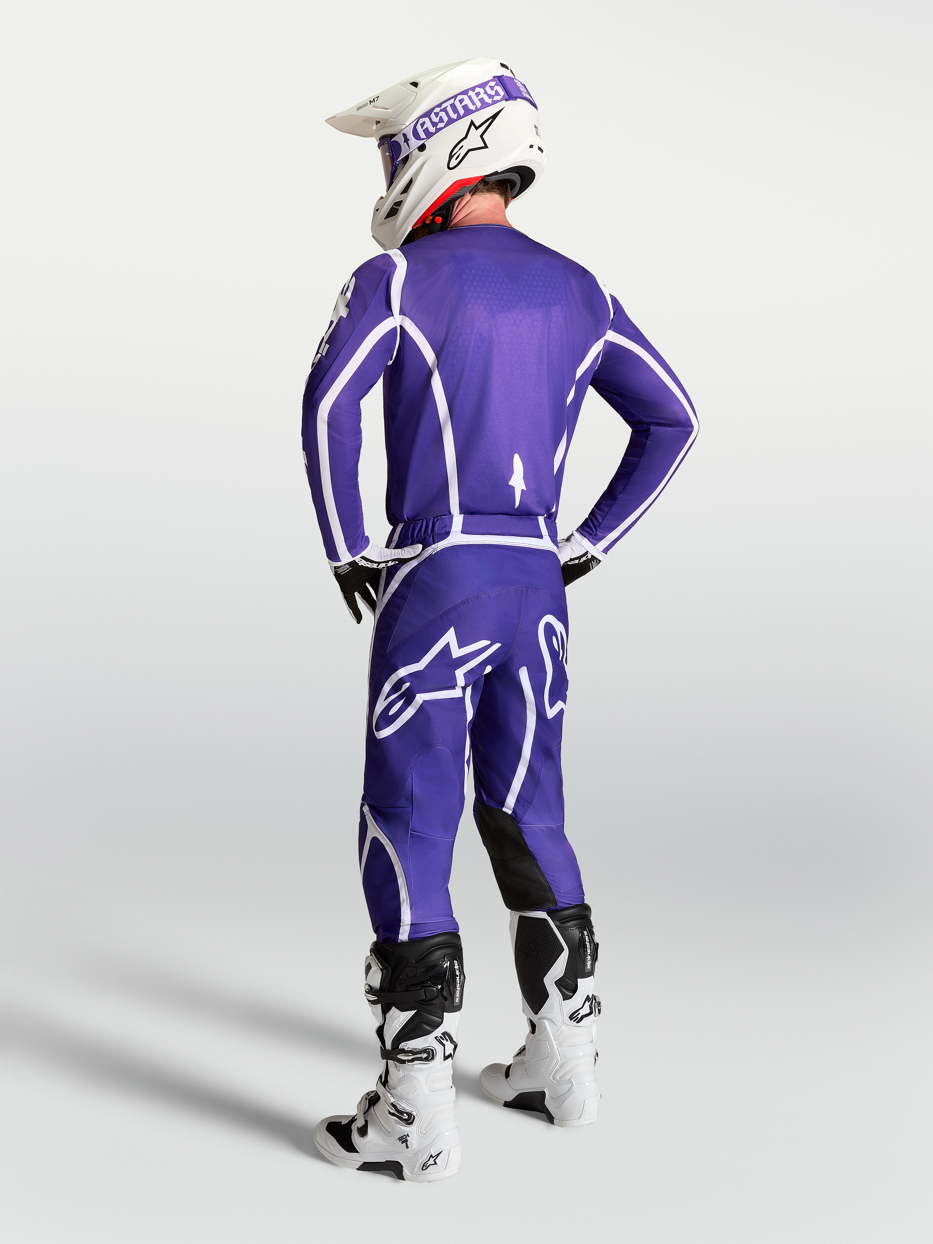 Alpinestars Fluid Apex V2 jersey, heren-motorcrosskleding in blauw en wit, achteraanzicht met atletische pasvorm.