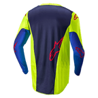 Alpinestars 2024 Racer Hoen Jersey, motorcross shirt, Yellow Fluo en Blue Night Navy, achteraanzicht met donkerblauw middenpaneel met rood logo, felgele zijpanelen, lange mouwen en ademende mesh-stof ontworpen voor off-road prestaties