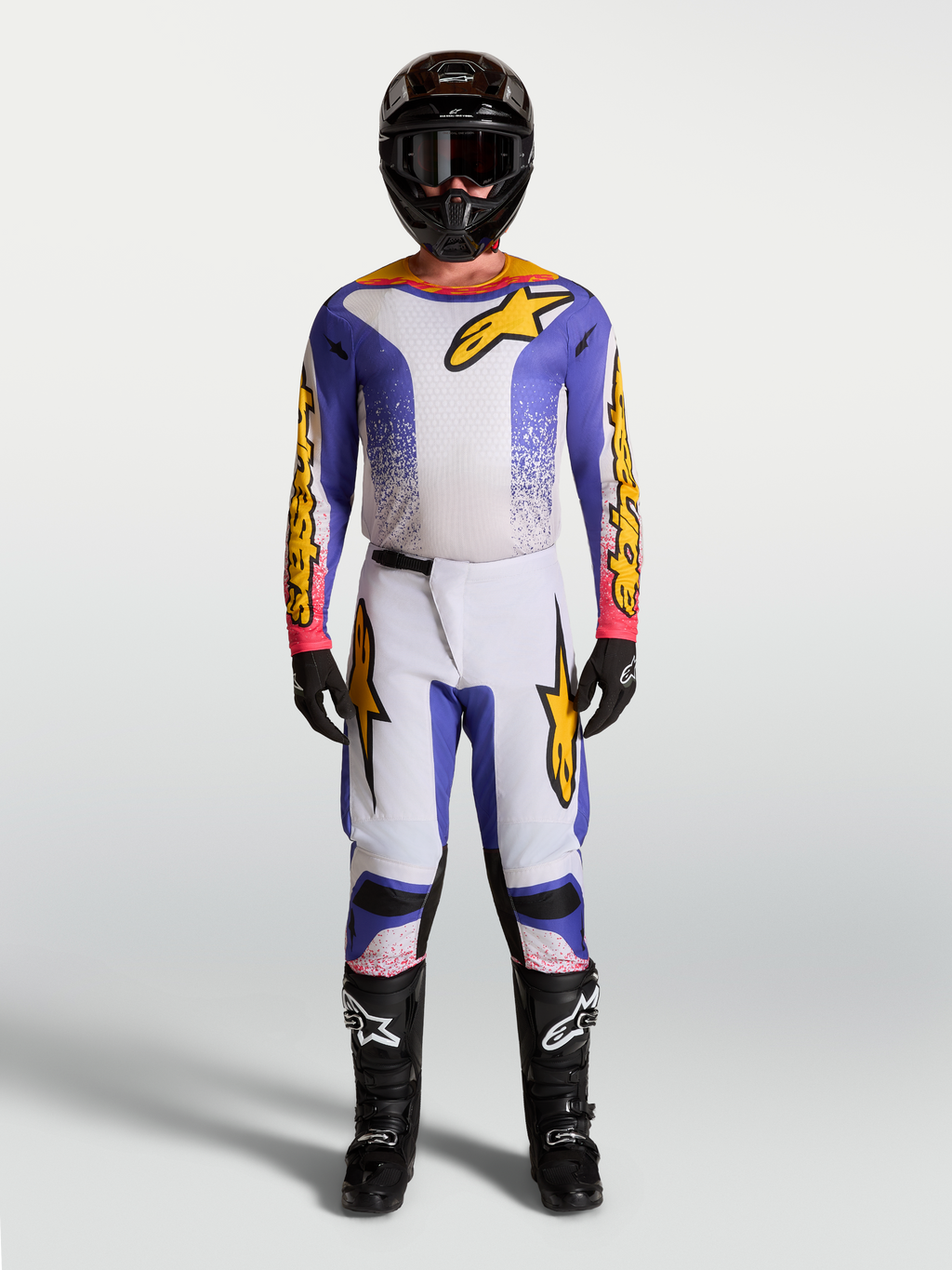 Alpinestars Fluid Drag Jersey and Gear Set, men's motocross outfit in blue and gold with ergonomic stretch textile.