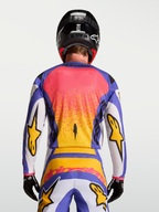 Alpinestars Fluid Drag jersey, motocross-uitrusting voor heren, paars en blauw met goud, achteraanzicht op model.
