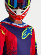 Alpinestars Fluid Drag jersey, heren motorcrossjersey in navyblauw en rood, met sportkraag en opvallend borstlogo voor off-road prestaties.