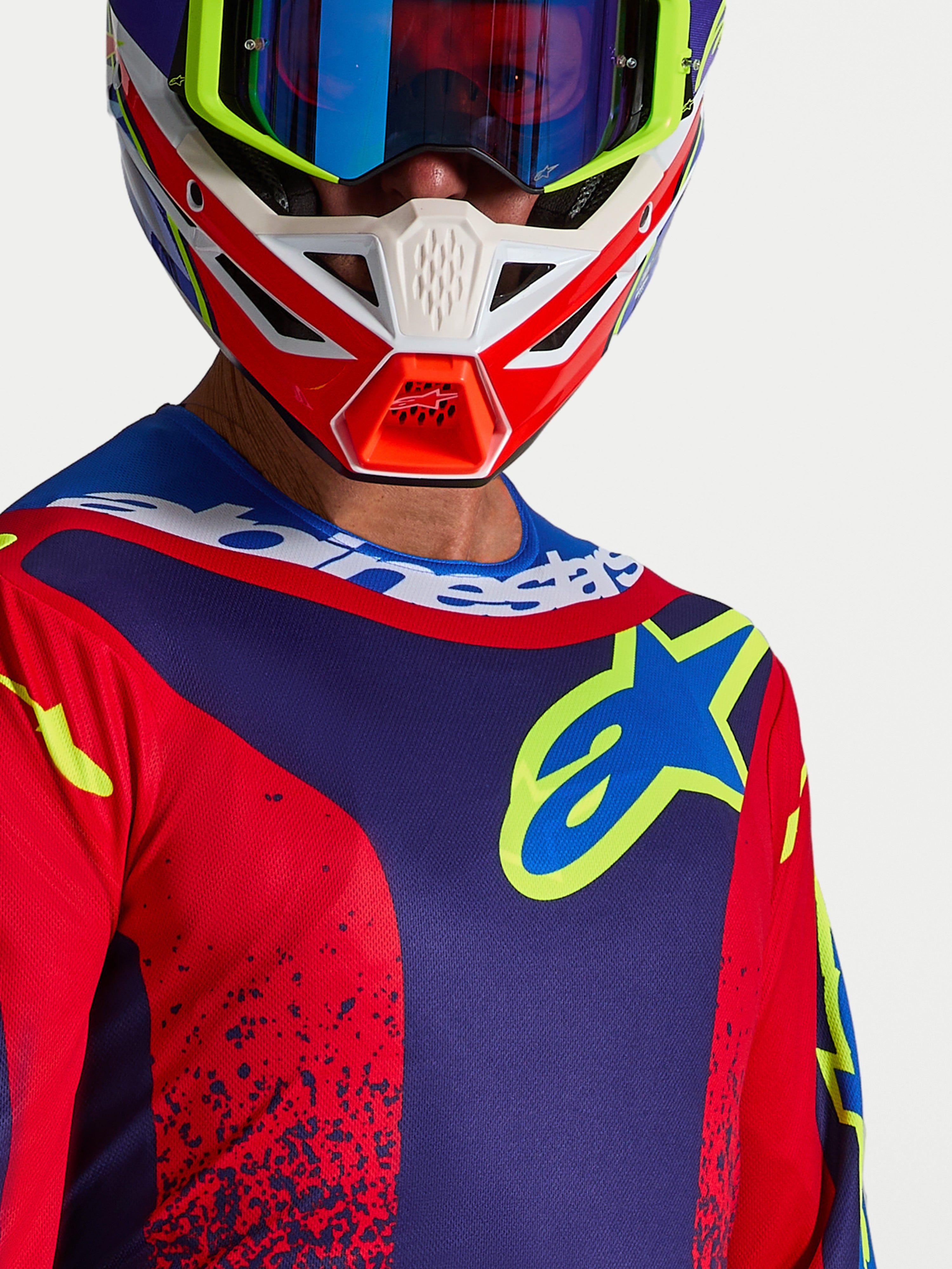 Alpinestars Fluid Drag jersey, heren motorcrossjersey in navyblauw en rood, met sportkraag en opvallend borstlogo voor off-road prestaties.