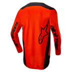 Alpinestars 2024 Fluid Lurv Jersey, motorcross shirt, fel oranje en zwart, achteraanzicht met groot zwart sterlogo en Alpinestars-branding op de mouwen, verlengde achterkant voor extra bedekking, lichtgewicht poly-stof voor off-road rijden