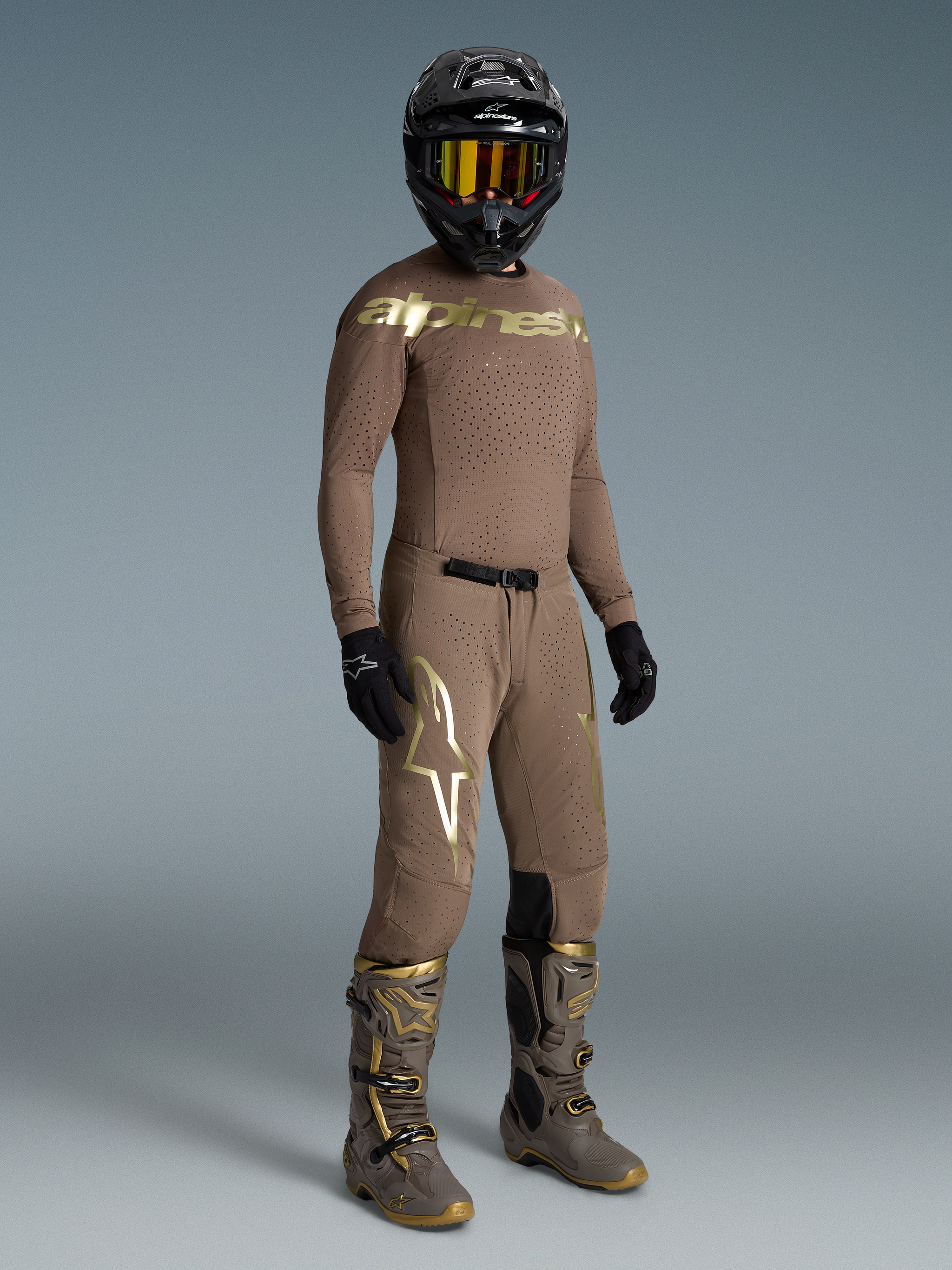 Alpinestars Limited Edition Supertech Air Gold Gear Set, tan motocross outfit with mesh jersey and gold accents.