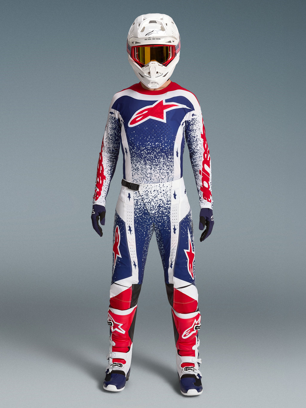 Alpinestars Techstar Unity beperkte oplage kledingset, heren motorcrossoutfit in wit, blauw en rood.