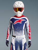 Alpinestars Techstar Unity beperkte oplage kledingset, rood, wit en blauw motocross-racekleding met een atletische pasvorm.