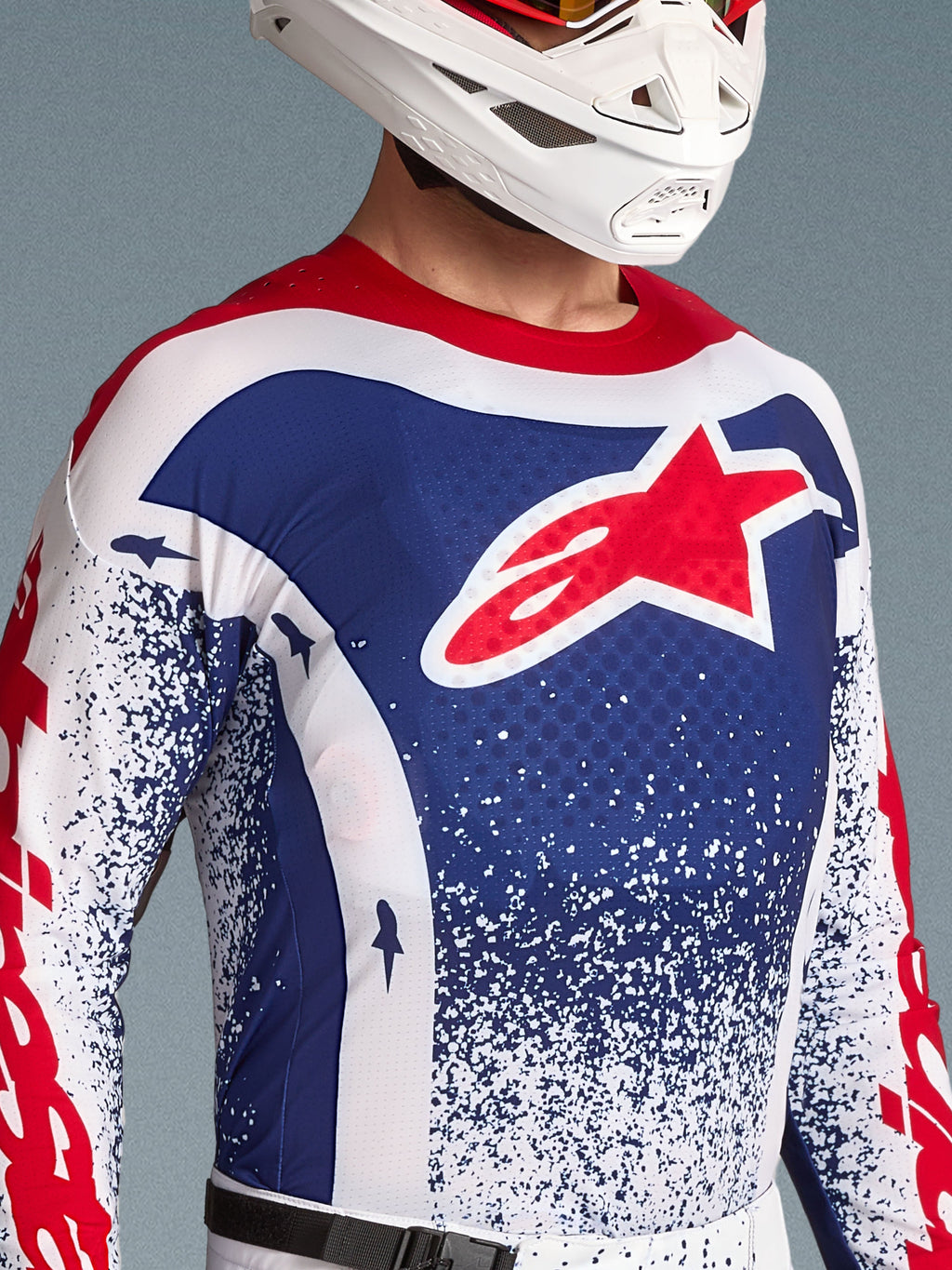 Alpinestars Limited Edition Techstar Unity jersey voor heren, blauw-wit motorcross-shirt met rood sterlogo.