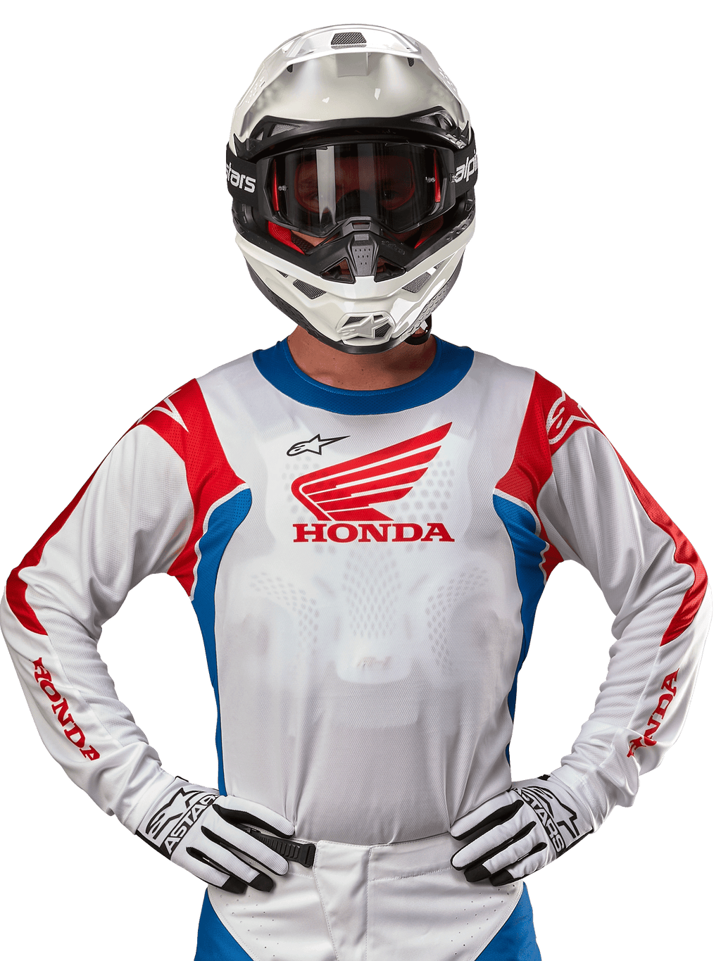 Alpinestars Honda Racer Iconic Jersey, wit motorcross shirt met een rood Honda-logo en felblauwe en rode accenten, gedragen door een rijder met een witte helm en handschoenen, prestatiegerichte kleding voor off-road en motorcross