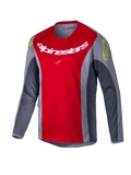 Alpinestars 2025 Youth Racer Melt Jersey, jeugd motorcrossshirt, felrood en grijs, voorzien van een groot wit logo op de borst en neongele accenten op de schouders, technische stof met lange mouwen voor off-road rijden