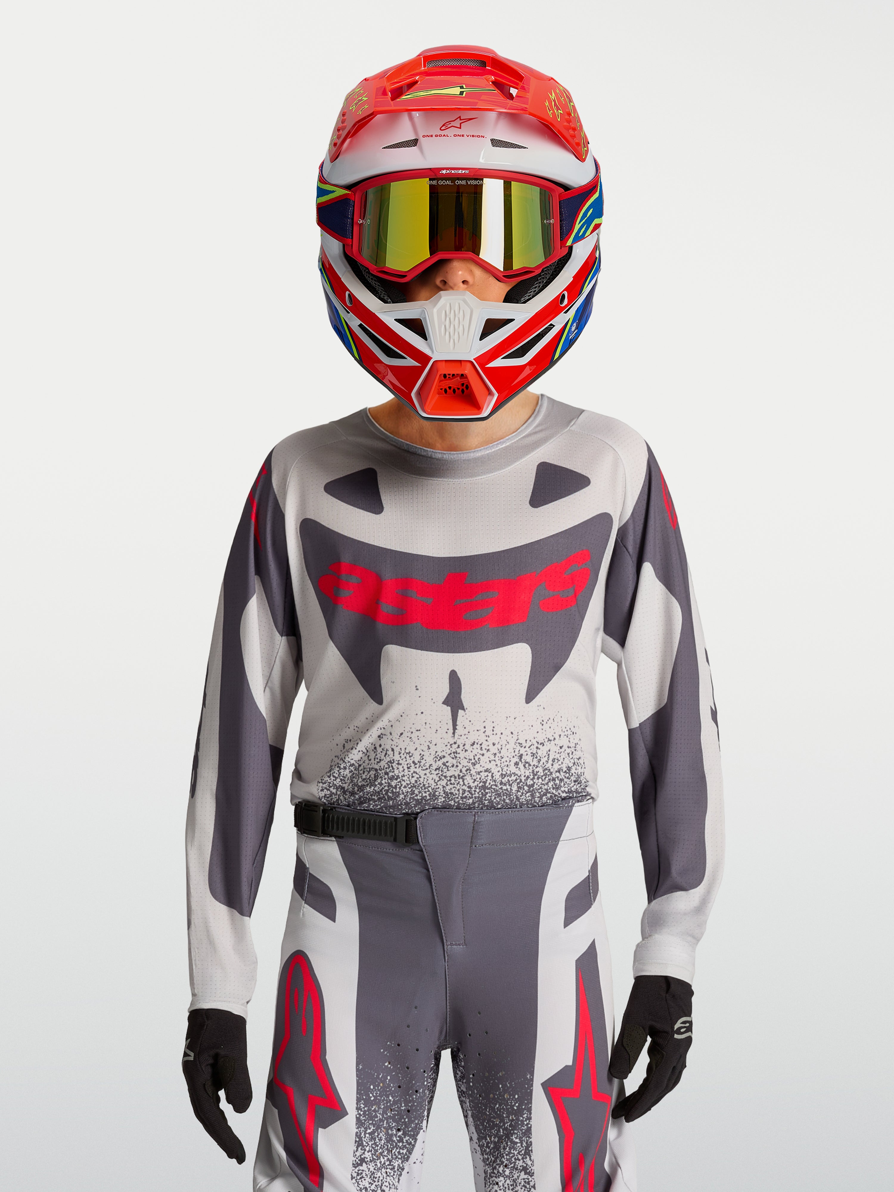 Alpinestars Jeugd Supertech Swan jersey en gear set, grijze en fluo rode motocross-outfit van ademend stretchmesh.