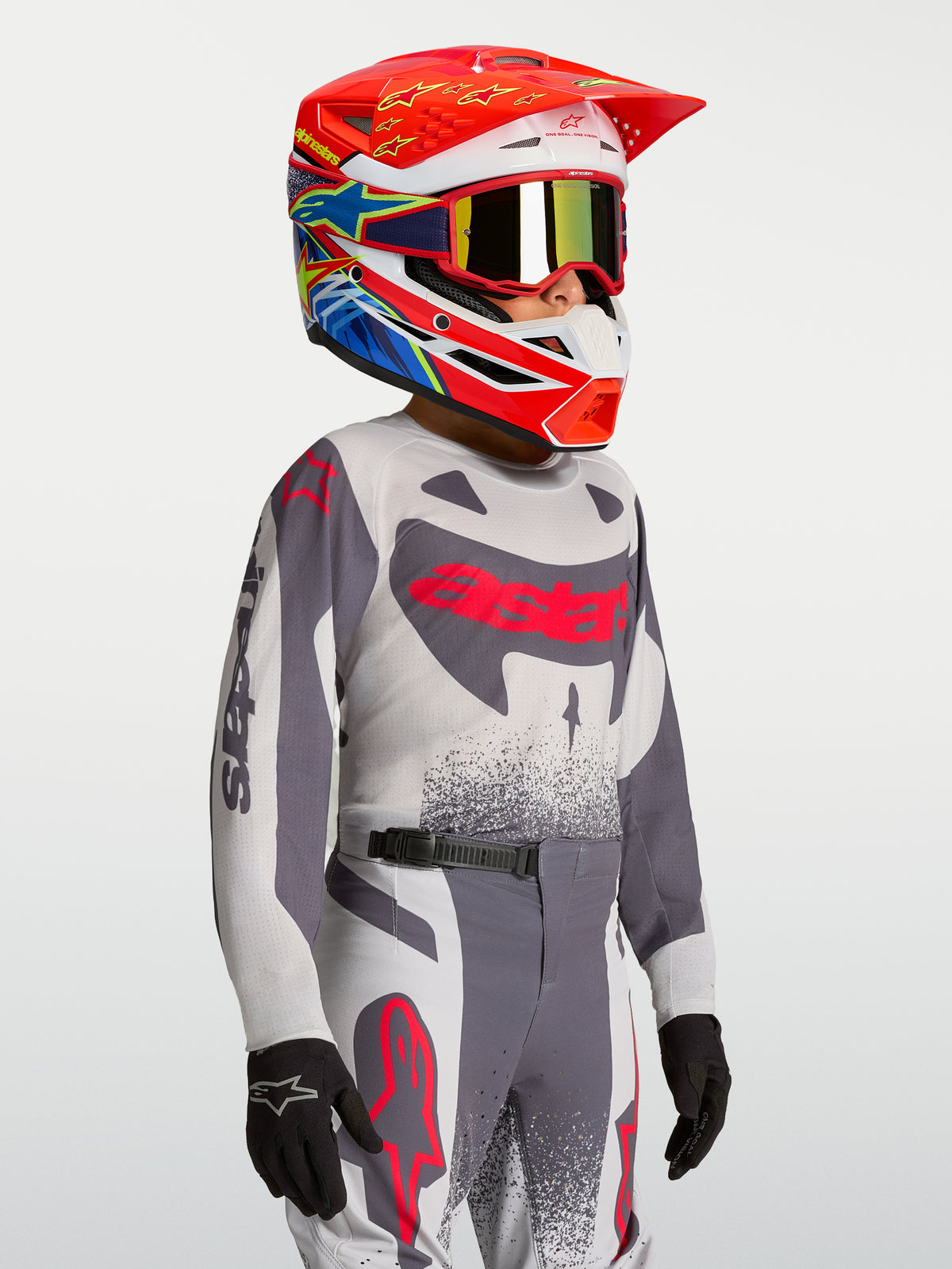 Alpinestars Jeugd Supertech Swan jersey en gear set 2027, grijs en rood, motorcross-racingoutfit voor jonge rijders.
