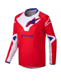 Alpinestars 2025 Youth Racer Veil Jersey, jeugd motorcrossshirt, rood met witte en blauwe accenten, vochtafvoerende stof met lange mouwen, grote Alpinestars-logo's op de borst en schouders, blauwe binnenkraag, prestatiegerichte off-road kleding