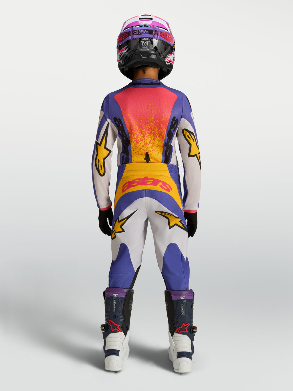 Alpinestars Jeugd Fluid Drag Jersey en uitrustingsset 2027 in blauw en goud, motorcross-uitrusting van achteren gezien.