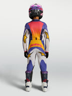 Alpinestars Jeugd Fluid Drag Jersey en uitrustingsset 2027 in blauw en goud, motorcross-uitrusting van achteren gezien.