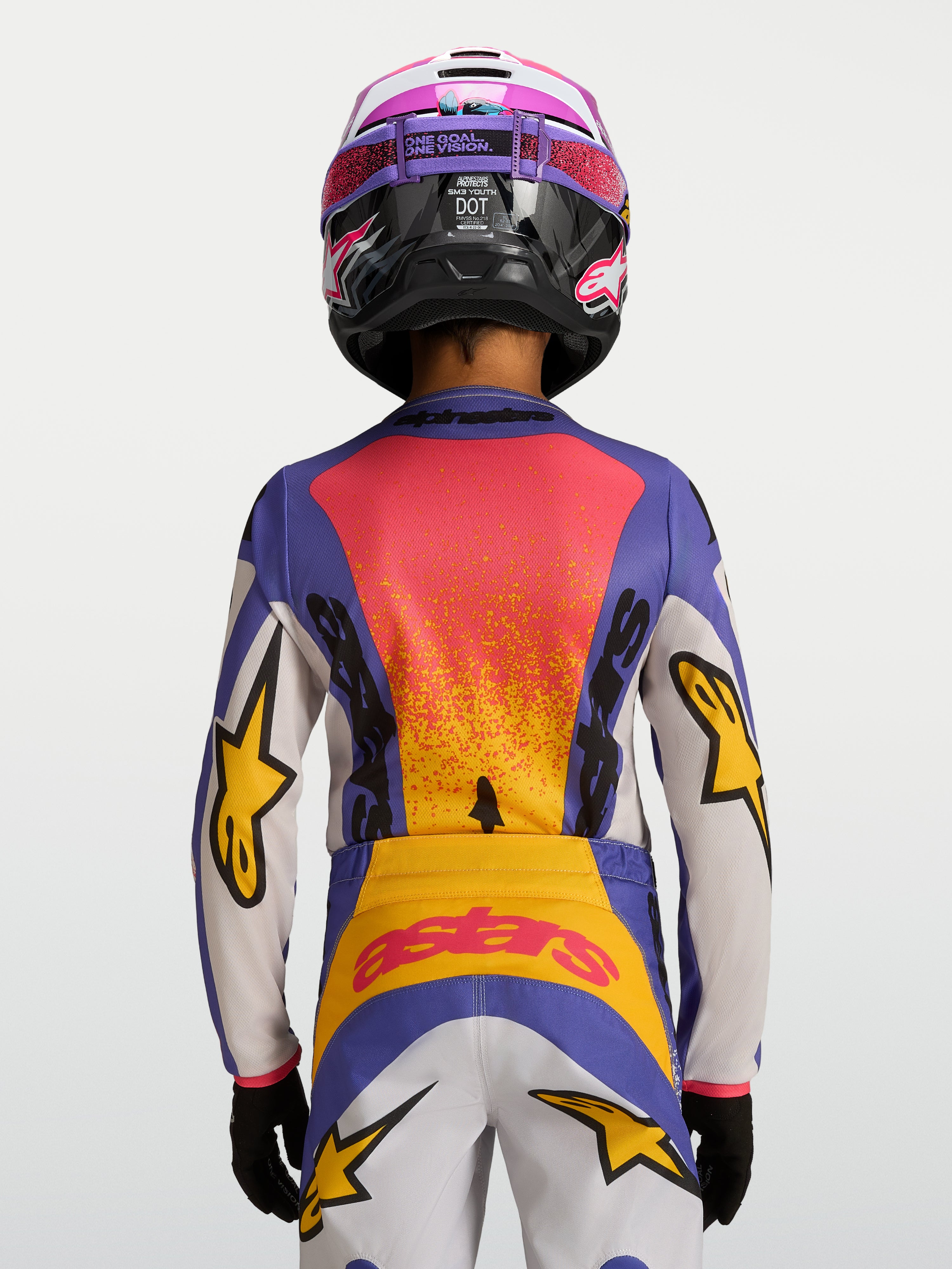 Alpinestars Jeugd Fluid Drag Jersey 2027, blauw en geel, achteraanzicht van motocrossjersey met race-geïnspireerde graphics.