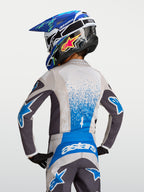 Alpinestars Jeugd Fluid Drag jersey, grijs en blauw vochtafvoerende motorcrossjersey voor kinderen, van achteren gezien.
