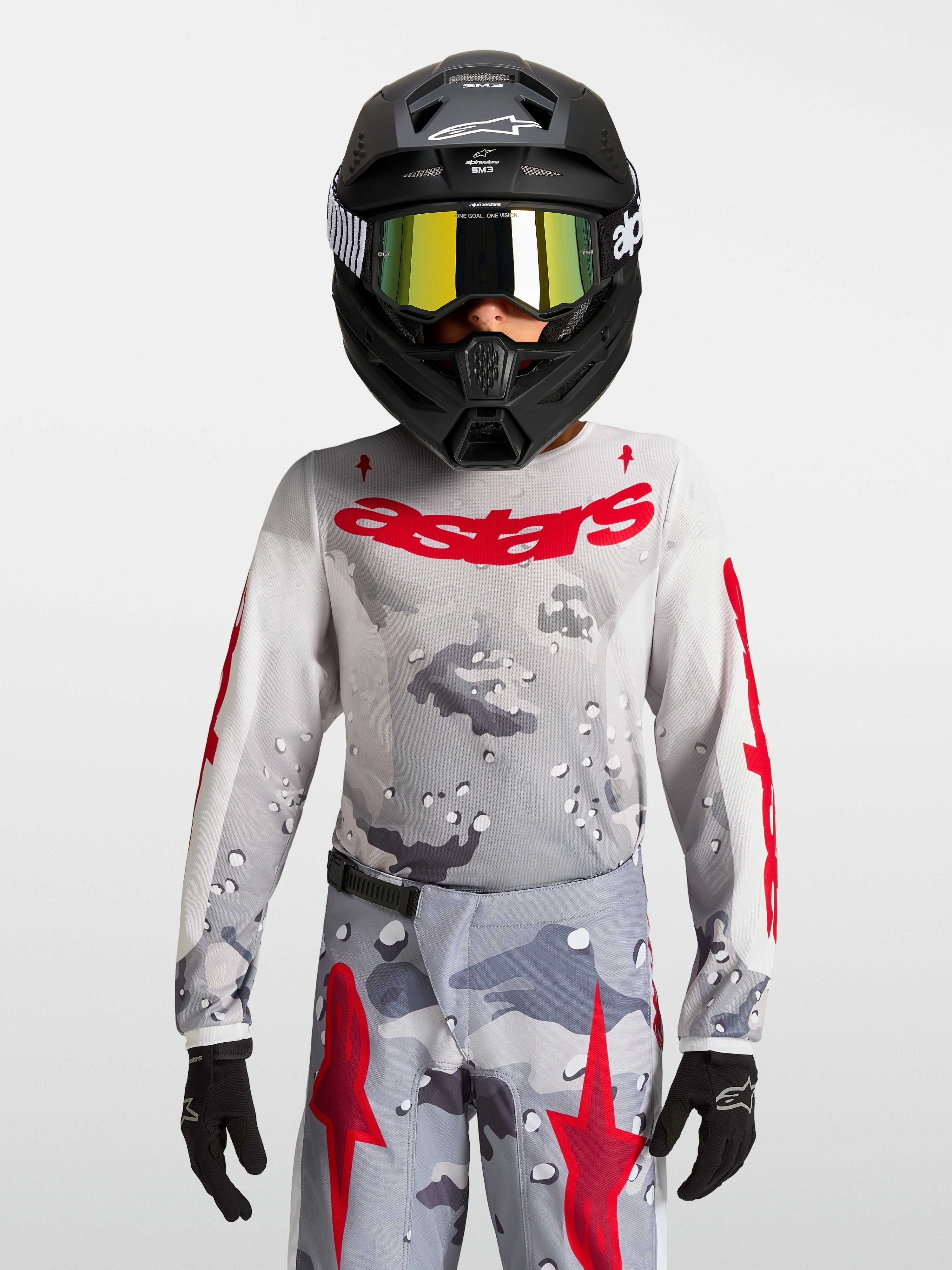 Alpinestars Jeugd Fluid Lone Jersey 2027, grijs camouflage en vuurrood, motorcross-jersey, ademende textielconstructie.