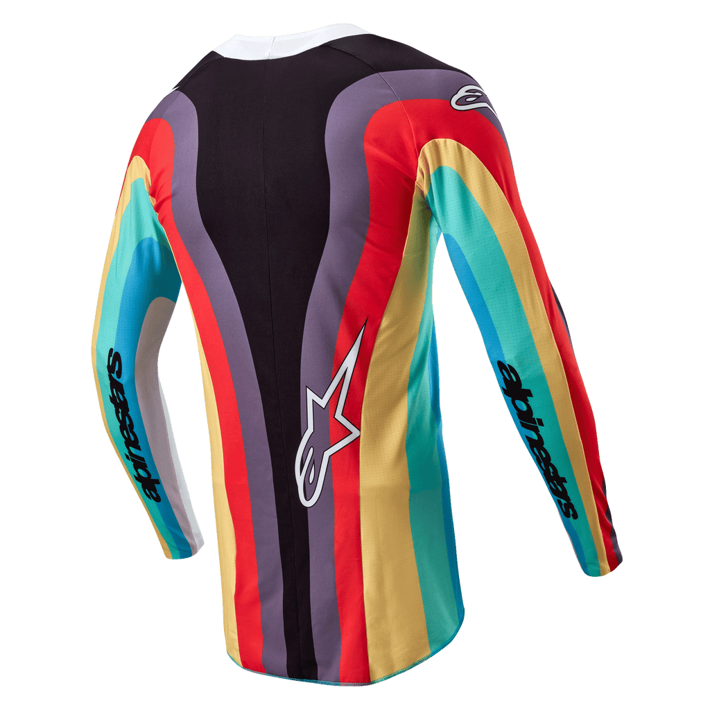 Alpinestars Stella 2024 Techstar Jersey, dames motorcross shirt, zwart multicolor, achteraanzicht met een levendig golvend veelkleurig patroon in rood, geel en turkoois, wit Astar-logo onderaan de rug, Alpinestars-branding op de mouwen.