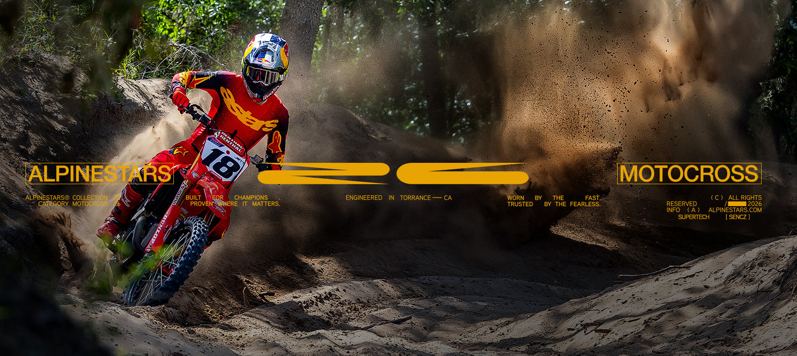 Alpinestars 2026 Supertech Sencz Motocross Gear Set in red and gold, worn by Jett Lawrence in racing action.