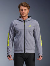 Alpinestars Chrome V2 Sport Hoodie, Gray Heather en Fluo Yellow, vooraanzicht op model, tech fleece motorhoodie met ritssluiting aan de voorzijde, neongeel ster-logo op de borst en branding op de mouwen, casual urban rijkleding