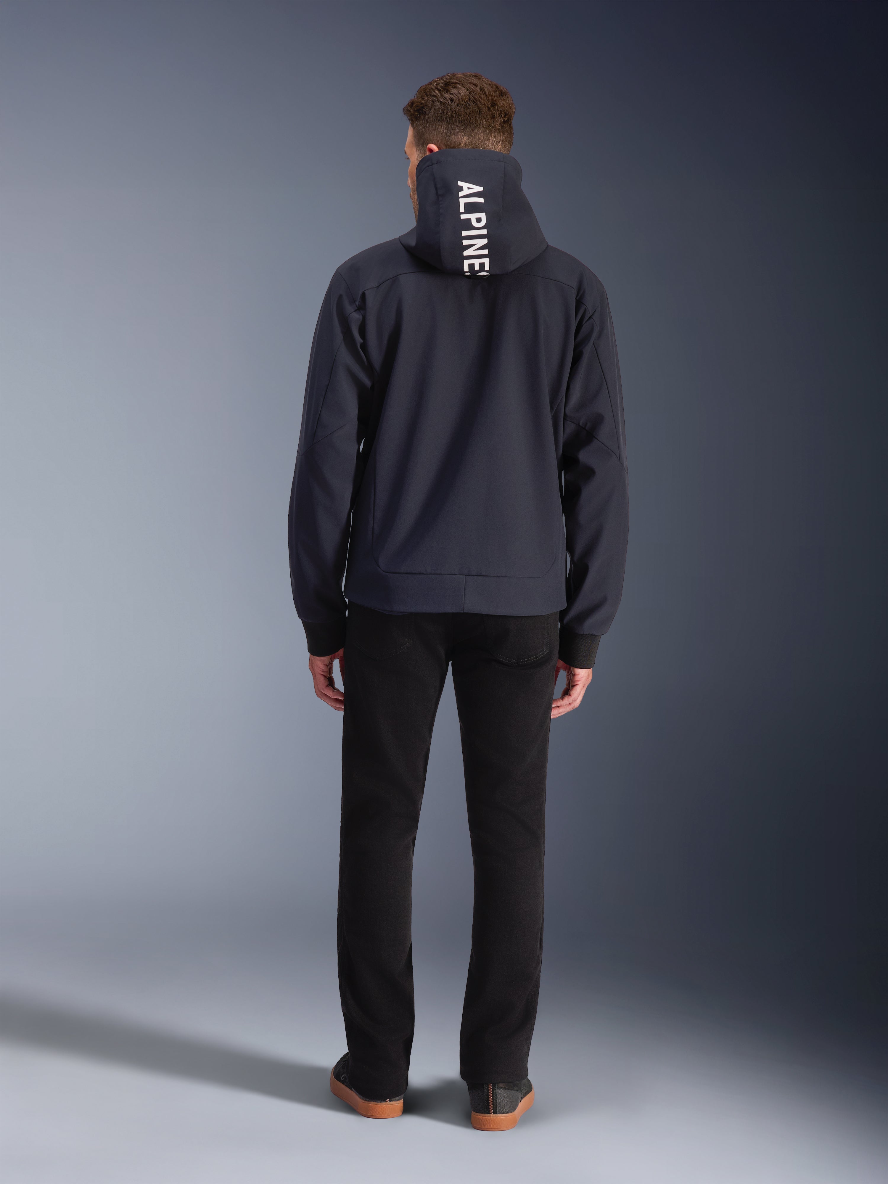 Alpinestars Radium Tech Hoodie, black windproof urban motorcycle jacket for men with white logo on the hood.