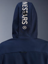 Alpinestars Radium Tech Hoodie in Night Navy Royal Blue, close-up of the back hood featuring vertical white Alpinestars branding and a secure loop attachment system, urban motorcycle technical apparel.