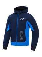 Alpinestars Radium Tech Hoodie, Night Navy en Royal Blue, technische shell-hoodie met volledige ritssluiting, wit Astar-logo en verticale branding, urban motorjas