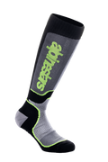 Alpinestars MX Plus sokken, kniehoge motorcross sokken, zwart, grijs en neongeel, met verticale Alpinestars-branding, geribbelde en mesh-texturen, technische rijuitrusting