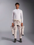 Alpinestars ZX Evo V3 Top, Long Sleeve, White, auto racing base layer worn with a light-colored racing suit tied around the waist and black racing boots, featuring a mock neck with logo and shoulder branding, professional flame-resistant motorsport underwear
