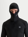 Alpinestars AT-8 Merino Balaclava, motorcycle and all-terrain adventure balaclava, black, worn by a model showing merino-blend thermal regulation and under-helmet comfort