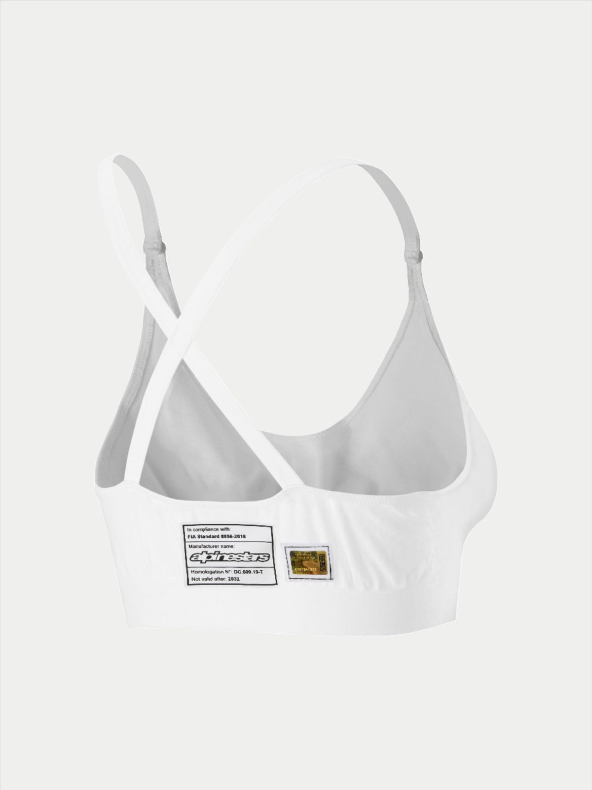 Alpinestars Stella TECH ZX Bra, witte vlamvertragende race-onderkleding, achteraanzicht met gekruiste rugbanden, voorzien van FIA 8856-2018 homologatielabel en hologram, lichtgewicht performance basislaag voor dames