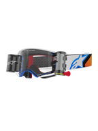 Alpinestars Supertech Corp Goggles Roll Off, motorcrossbril, blauw en oranje design, wit frame met heldere lens en roll-off systeem, voorzien van wide vision canisters en een blauw Astars-logo op de band