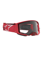 Alpinestars Supertech Vesta veiligheidsbril voor motocross racing, rood en wit, met heldere lens en logo-band.