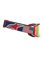 Alpinestars Supertech Fiftyfold motorcrossbril, blauw en rood met rode spiegellens en USA-vlag patch, limited edition.