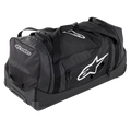 Alpinestars Komodo Reistas, grote reistas voor uitrusting, zwart met witte Alpinestars-logo's, voorzien van stevige wielen, versterkte handgrepen en meerdere compartimenten met ritssluiting voor het georganiseerd opbergen van race-uitrusting
