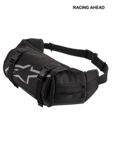 Alpinestars Tech Tool Pack, Black, durable motorcycle tool waist bag, featuring grey Alpinestars star logo, adjustable compression straps with plastic buckles, and zippered side compartments for enduro and off-road use